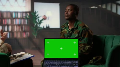 Man in Uniform Attending Counseling Session with Green Screen