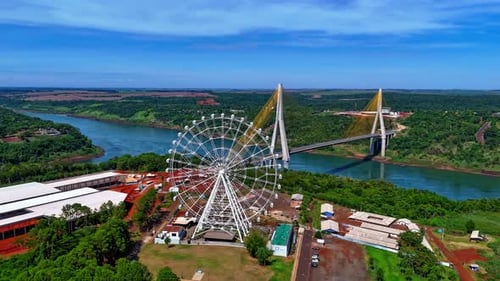 hyper lapse of the ferris wheel in Foz do Iguaçu with the Paraná River in the background
