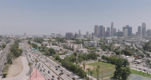 a city with many cars and buildings