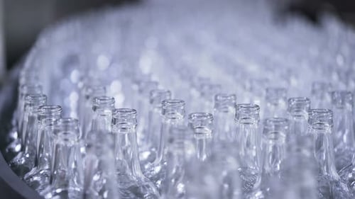 Automated Bottle Conveyor Belt in Factory