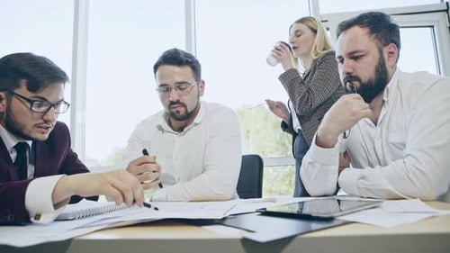 Teamwork in Modern Office: Focused Collaboration on Project