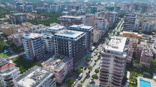 Aerial View Completed Residential Complex With Azure Pool and Water Slides for Kids By the Sea