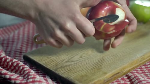 Process Cutting Peel of Fresh Apple. Preparing Diet Food. Hands Cut Peel