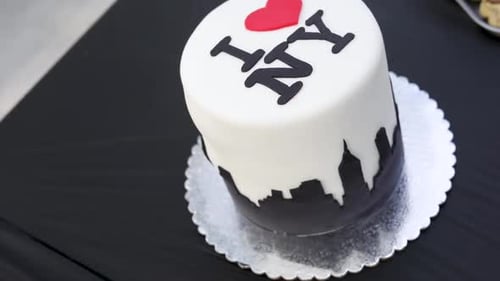 New York Cake With City Skyline on Table