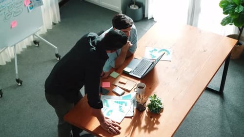 Top view of smart business team working together to analysis data. Convocation.