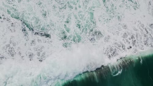 Foamy Ocean Water Splashing Super Slow Motion Aerial Stormy Swell Making Waves