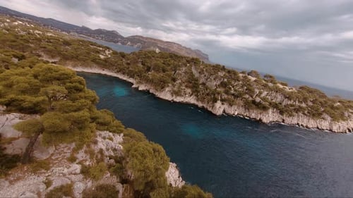 FPV aerial over the coastline of Cassis, southern France.