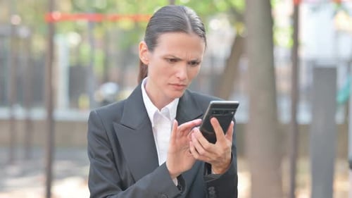 Portrait of Business Woman Criticizing Online Loss Outdoor