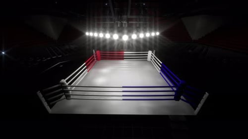 Empty Boxing Arena with Spotlight on the Ring