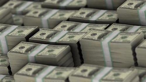Abstrakte Stapel von 100-US-Dollar-Scheinen mit Filmmusik geringer Schärfentiefe