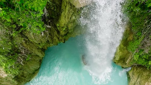 Waterfall in the Tropical Mountain Jungle