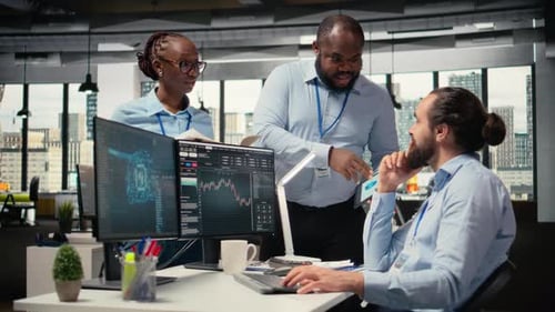 Teamworking Traders in Prop Firm Office Leverage AI Tech to Interpret Charts