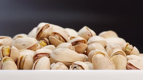 Heap of Pistachios Rotating in Close Up