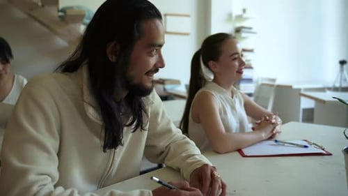 Smiling Professionals Working Together in a Bright Office