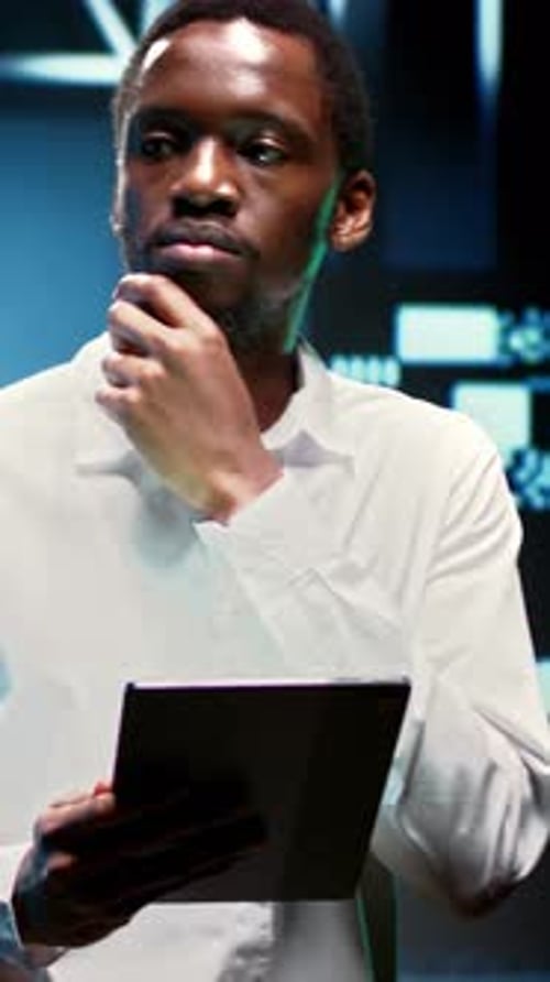 Portrait Format Computer Scientist Maintains High Tech Room Equipment Systems