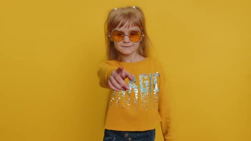 Child Girl Kid Smiling Excitedly and Pointing Finger to Camera Choosing Lucky Winner Indicating