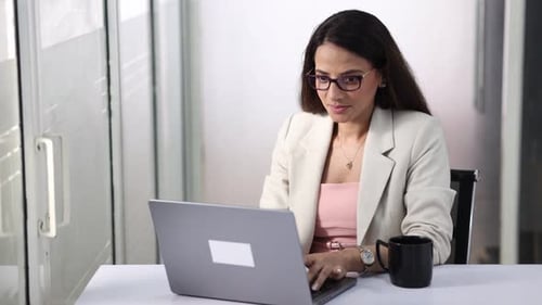 Office Worker Using Laptop