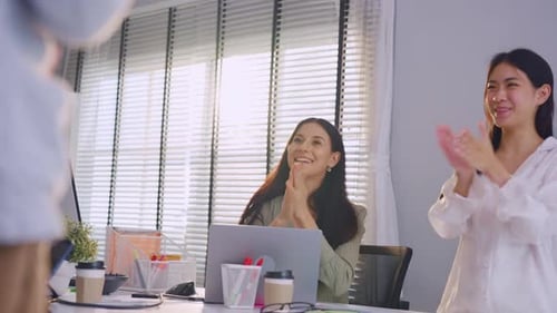 Group of young businessman and businesswoman working in the office.