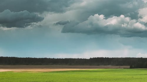 Hyper Lapse Colorful Cloudy Blue Sky Fluffy Clouds Above Grassland