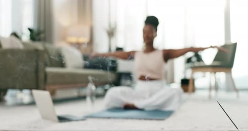 Incense, yoga and meditation with a black woman on the floor of a living room in her home for health
