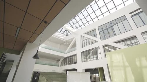 Hallway and High Glass Ceiling in Stylish Business Center