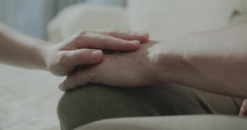 Supporting Hand Offers Comfort and Reassurance