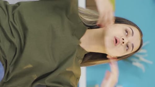 Woman Massaging Neck and Shoulders for Relief