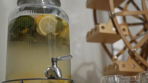Lemonade and Mint in Drink Dispenser Close Up