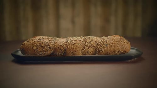 Organic Whole Grain Bread on Kitchen Table Ready for Eating