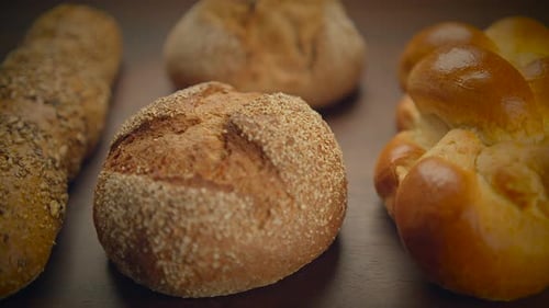 Various Types of Bread a Staple Food are Displayed on the Table