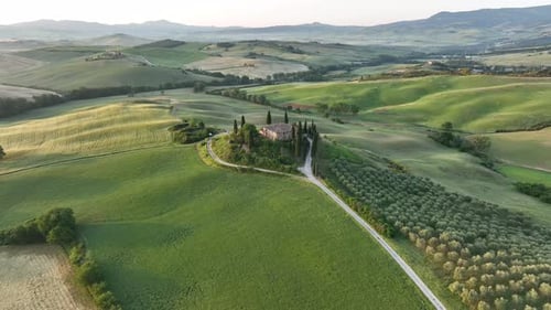 Aerial video on the hills of Tuscany in San Quirico, Belvedere view at sunrise - Tuscany