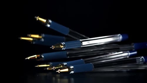 Pens Fall on the Table Filmed on a Highspeed Camera at 1000 Fps
