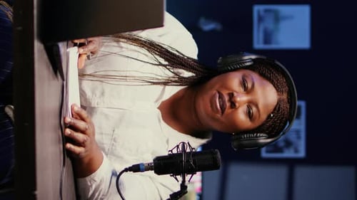 Vertical Video Media Star Using Professional Recording Equipment to Film Vlog Channel Intro for