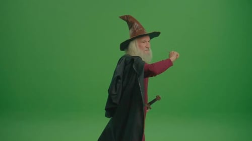 Wizard Walking with Magic Wand on Green Screen