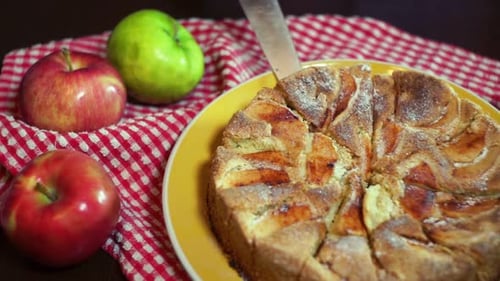 Fresh Apple Pie Cut Into Slice on Plate
