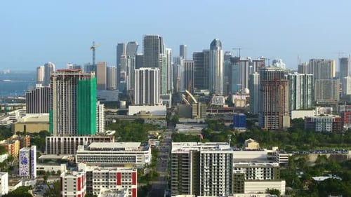 Real Estate Development in Miami Urban Area Tower Lifting Cranes at High Residential Apartment