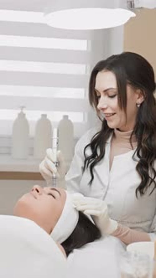 Medical Professional Performing Cosmetic Procedure