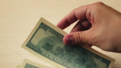 Stacks of Cash Dollars and Euro Banknotes Counting Buying Car Flat Home or Real Estate Counting