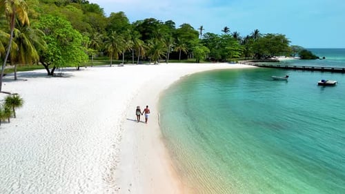 Romantic Stroll Along the Pristine Shores of Koh Kham Island in Thailand