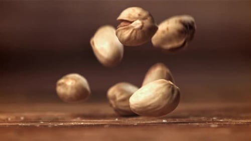 The Pistachios Fall on the Table Filmed on a Highspeed Camera at 1000 Fps