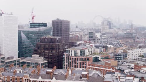 This shot depicts a panoramic view of London with a clear outlines of the most loved historical monu