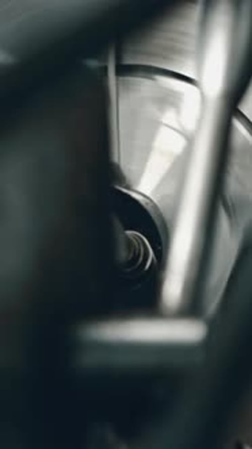 Spinning industrial machinery with moving parts in factory