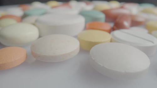 Medical Tablets Pills and Capsules Rotating Close Up