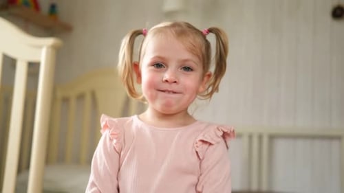 Little Girl Joking Sticking Tongue Out with Silly Expression Child Making Face Funny Foolishness