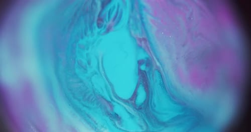 Abstract Turquoise, Blue, and Purple Swirling Liquid