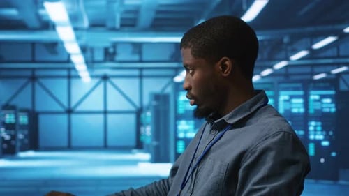 Man Safeguarding Data Center Hardware Against Unauthorized Access