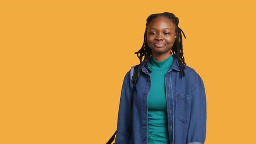 Cheerful Student Witch School Rucksack Doing Greeting Hand Gesture