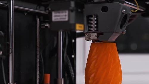 Modern 3D printer printing a prototype. Three dimensional printer