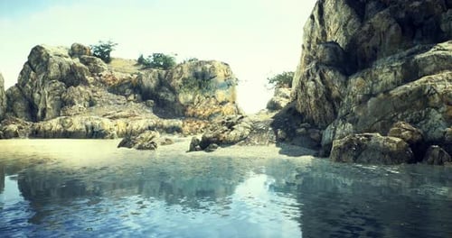 Scenic Coastal View with Rocky Cliffs and Tranquil Waters During Daylight