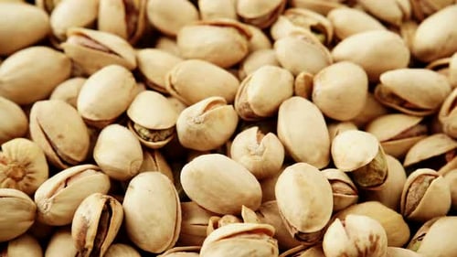 Pile of delicious shelled and unshelled pistachios